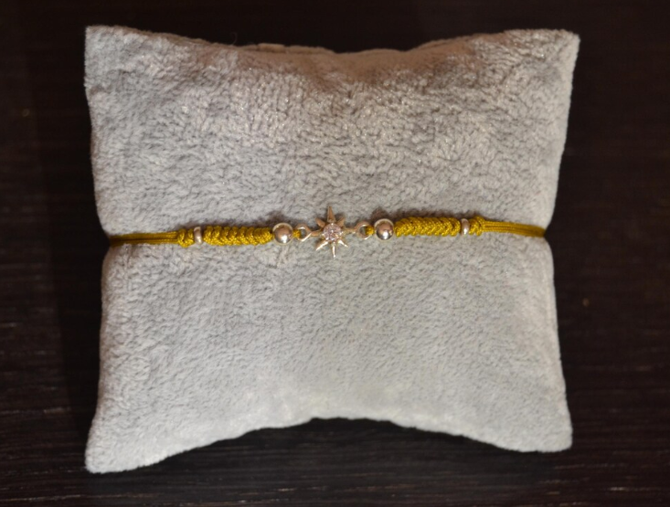 Pulsera Estrella Polar de hilo con pieza central y circonita en plata de ley 925